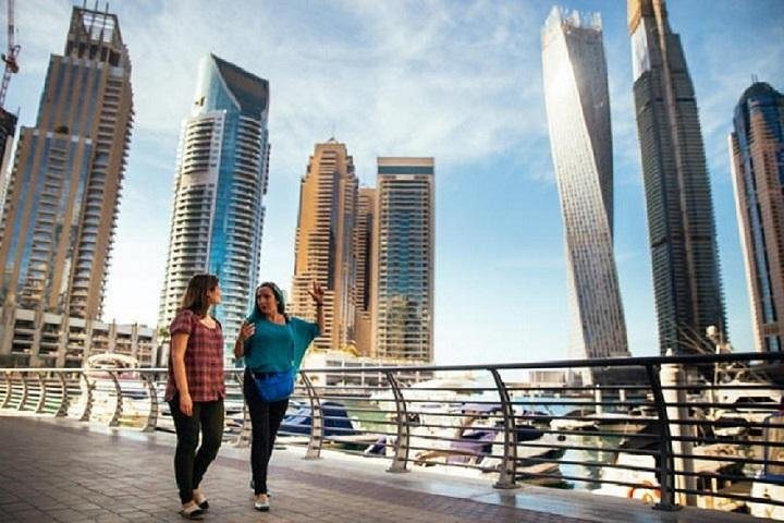 Explore iconic landmarks like Burj Al Arab and Dubai Creek while strolling through the city’s stunning architecture and vibrant local life on this unforgettable Dubai experience.